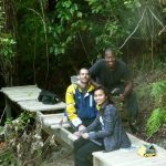 Earl Eve and Marcello working on fixing the meditation walking path deck.