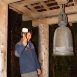 James delivers twelve hearty blows to the bell to ring in the new year.