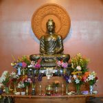 The sala shrine on new years day festooned with flowers.