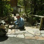 Gavin making the connection between the new transition step and the side wall.