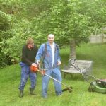 Craig and Drew working hard tidying up the grounds ready for Kathina. The new mower shines.