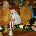 Ben making an offering to Ajahn Kusalo.