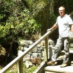 Simon here in his role as stonemason getting underway to finish the wall alongside the stairs up to the carpark.