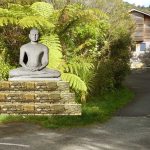 The entrance to the monastery with a photo projection of a large Buddha image. There are many choices to be made as to the final.