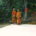 Ajahn Kusalo and venerable Kusalacitto testing the new floor of the lower kuti.