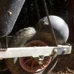 Our wheelbarrow has had a hernia.