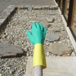 A drying kitchen glove gives a rocky benediction.