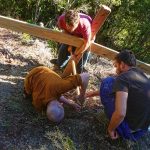 Ajahn fine tuning a brace on the new patio retaining wall.