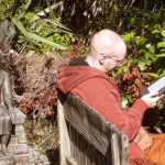 The upper house patio being enjoyed by Ven. Hiriko. The Buddha supervises the retaining wall work.