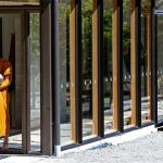Having received alms in the kitchen Venerable Thitavijjo heads up to the dana sala to chant the anumodana.