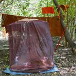 Venerable Sumangala has his umbrella tent set up.