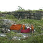 We find another rock promontory and lay out robes to dry.