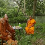 A monk we had met a couple of days earlier passed us in a car and offered to set up 'tea by the river.' Delightful.