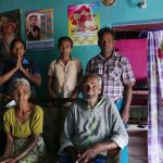 The man in the blue sarong invited us to his home for tea and to meet the family.
