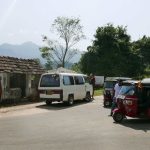 From the van we transfer into tuk-tuks. Those hills are getting closer.