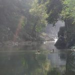 The river below the kuti provides an idyllic bathing spot.