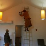 Ajahn Dta taking care of time.