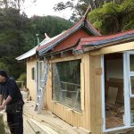 Bruce the builder looks out. Ajahn Kusalos old kuti has a new front.