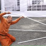 Ajahn slides another piece of the tent puzzle into place.