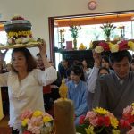 At the Vietnamese temple for Kathina. The cloth and requisites being offered to the sangha.