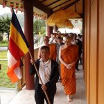 At the Vietnamese temple for Kathina. The cloth is circumambulated.
