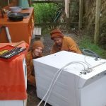 The washing machine is dead. Monks are trying to make a change :) - but can we get the faulty part?