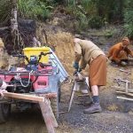 With timber at a premium we are recycling *everything*. The sangha pulls nails to keep Bruce supplied as best we can.