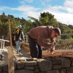 The stupa scaffold is all but down and now to the de-nailing.