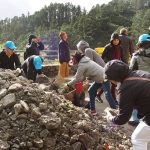 The rubble from the concrete slab and old stone wall is removed.