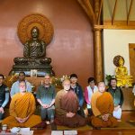 The 2020 committee with the sangha just after the AGM.