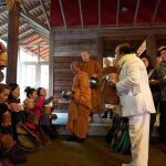 Luang Por Poi leads the Sangha.