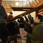 Just after we agreed that proceeding should start we agreed that we werent that many people and... it was cold. Many hands help lower the sala doors.