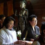 Carrying offerings and chanting Itipi so... the lay community circumambulate the sala.