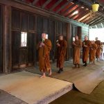 The sangha lead the sala circumambulation.