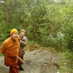 Ajahn Pum and Venerable Kusalacitto make their way up to the Bhikkhu Vihara.
