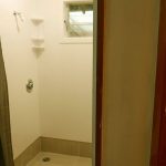 One of the new shower stalls with a 2nd stall to the left next to the new bathroom. A far better use of the old space.