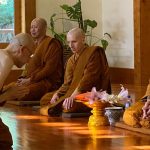 Taking the samanera refuges and precepts.