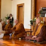 Anagarika Jet receives his samanera robes from Ajahn Kusalo.