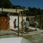 The roof is off and walls are falling.