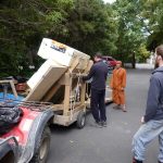 Beat preparing a load of building materials to go up to the new monks kuti.