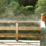 Early morning steam lifting off the handrail at the back of the sala.