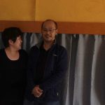 Arunee and Kheng take a well earned rest after installing the curtains in Ajahns kuti.