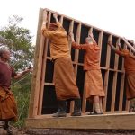 The new monks kuti sees the first wall raised. Three more to go - then and roof.