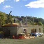 Steel uprights in place with walls off to one side.