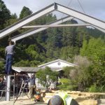 Roof frames being craned into position.