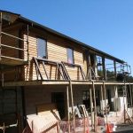 The front sun porch being framed.