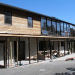 The front sun porch being framed and ready for glazing.