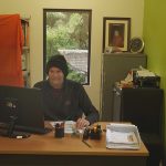 Lindsay making sure the monastery wheels turn smoothly in the office.