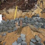 The stone wall at Ajahns kuti slowly takes shape.