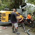 The concrete pumping guys are getting ready. Six cubic meters of concrete needs to go up the hill and around the corner.